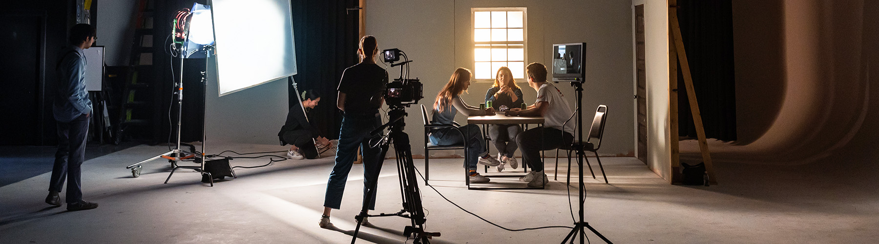 Loyolans on set as they shoot an indoor scene